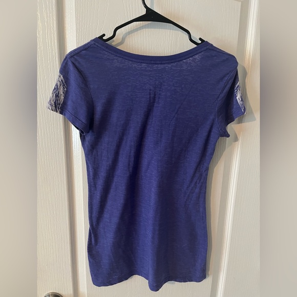 S Woman’s Tee with Feather Design on Shoulder - Picture 2 of 4